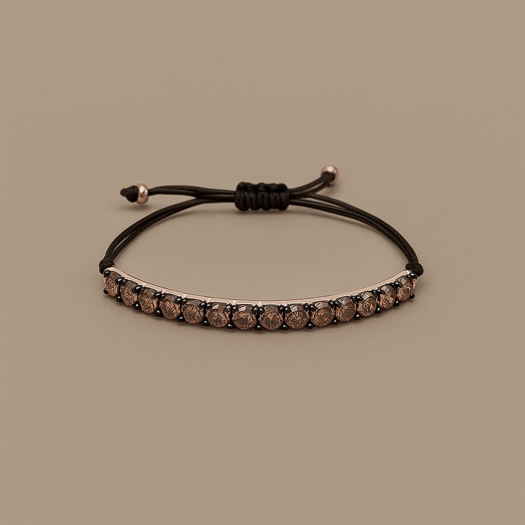 Bracciale tennis  con cordino oro 18 kt