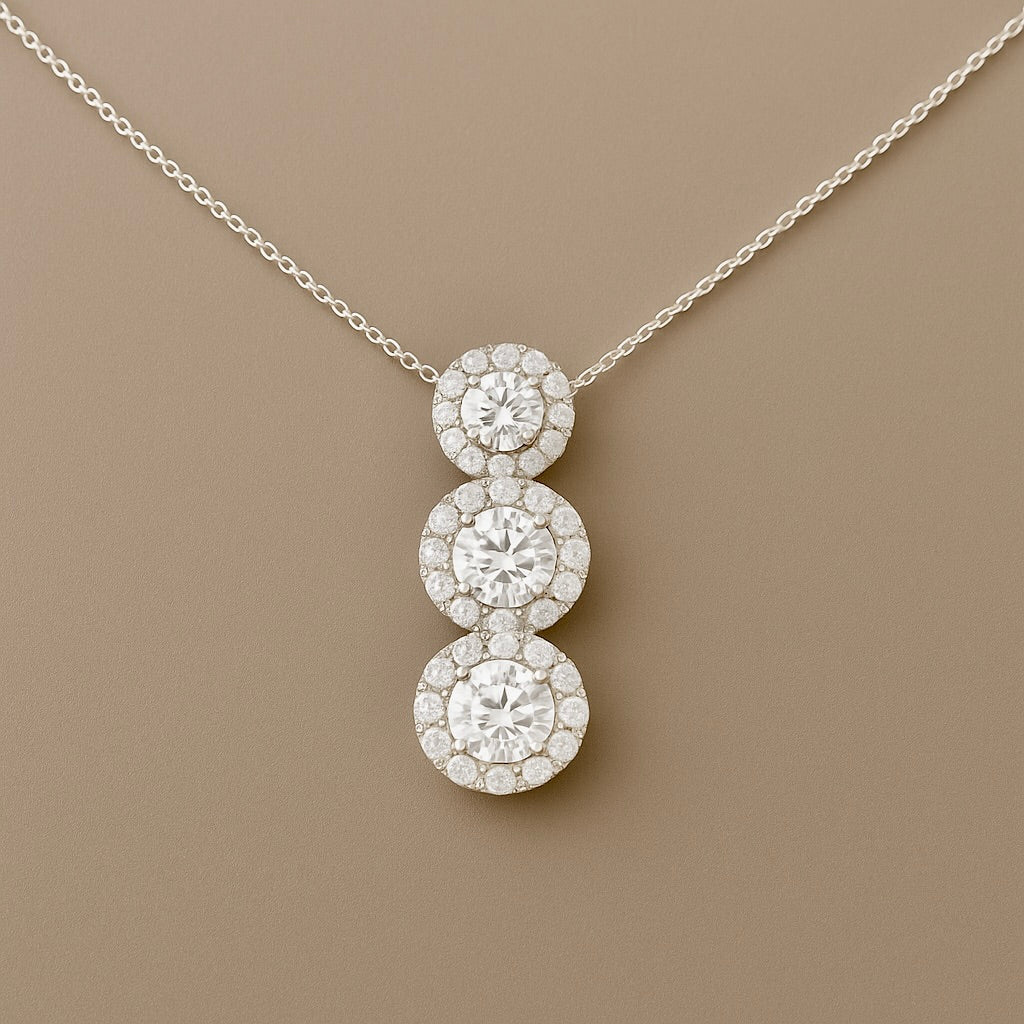 Ciondolo trilogy contorno diamanti