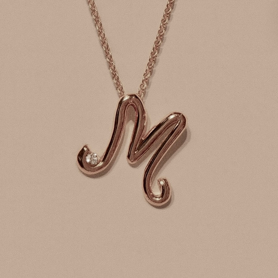 Ciondolo iniziale a filo 9kt