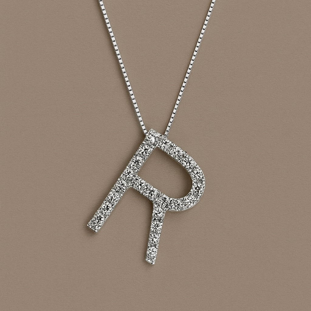 Ciondolo iniziale 18kt