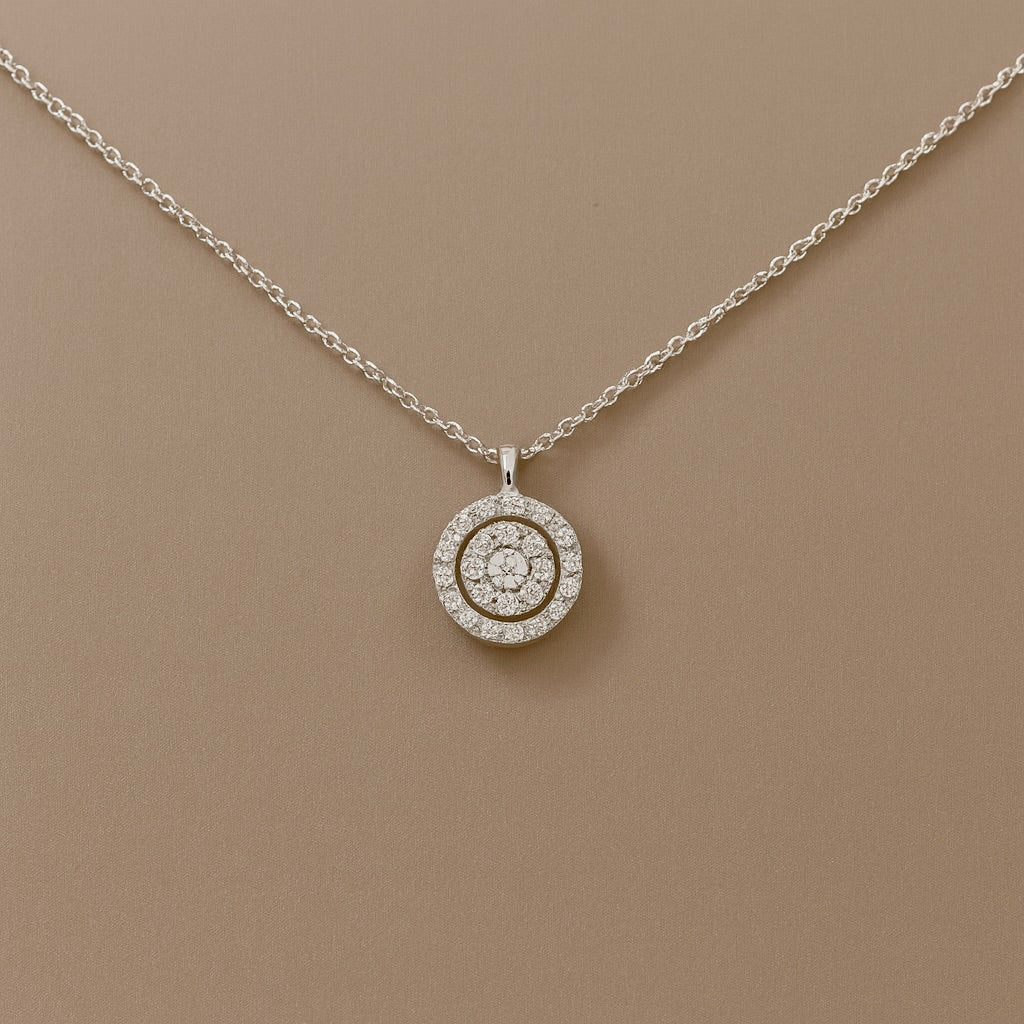 Ciondolo punto luce diamanti con contorno