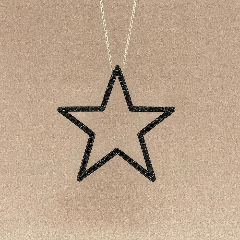 Ciondolo stella con diamanti neri