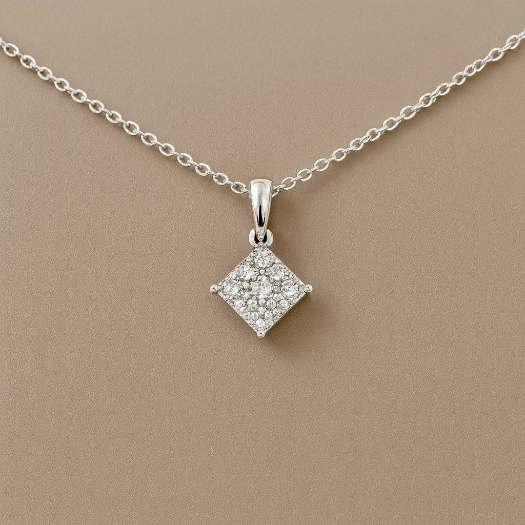 Ciondolo punto luce diamanti con montatura a rombo